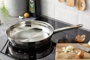 Pánev WMF Profi Favorit nerez. ocel, Ø 24/28cm,varianty: